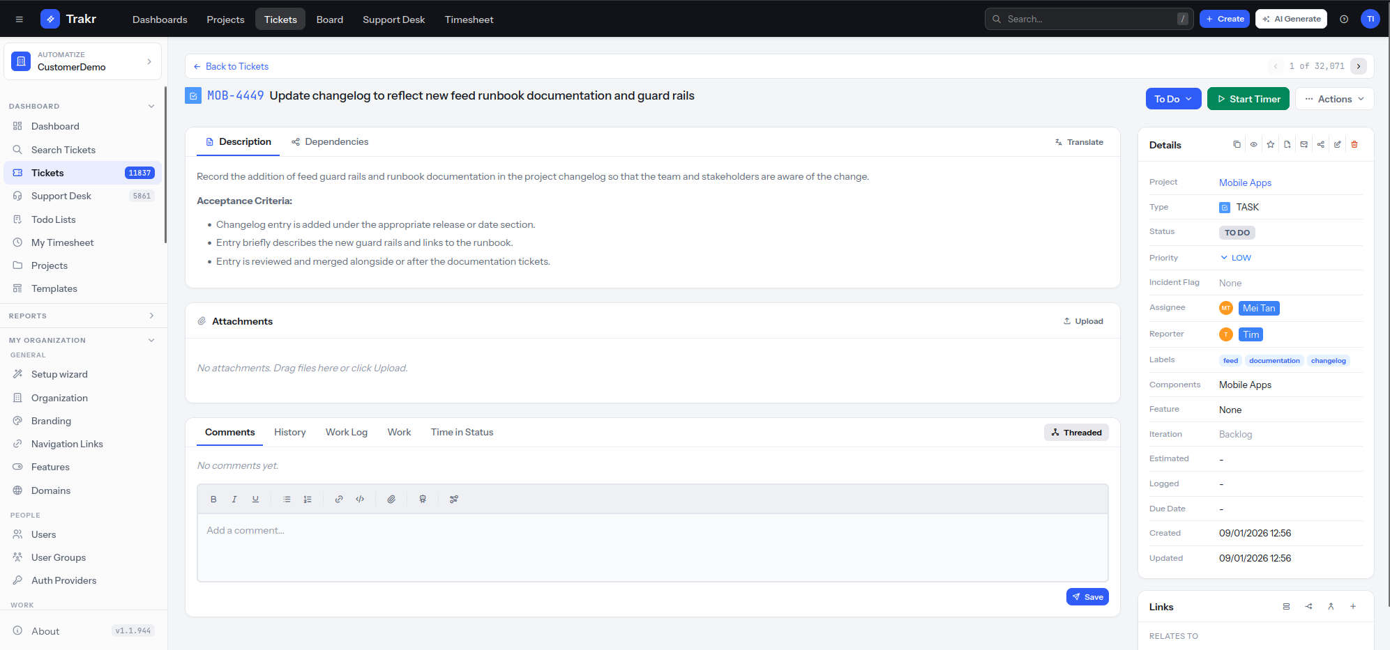 Trakr ticket detail with description, acceptance criteria, attachments, comments and a details panel